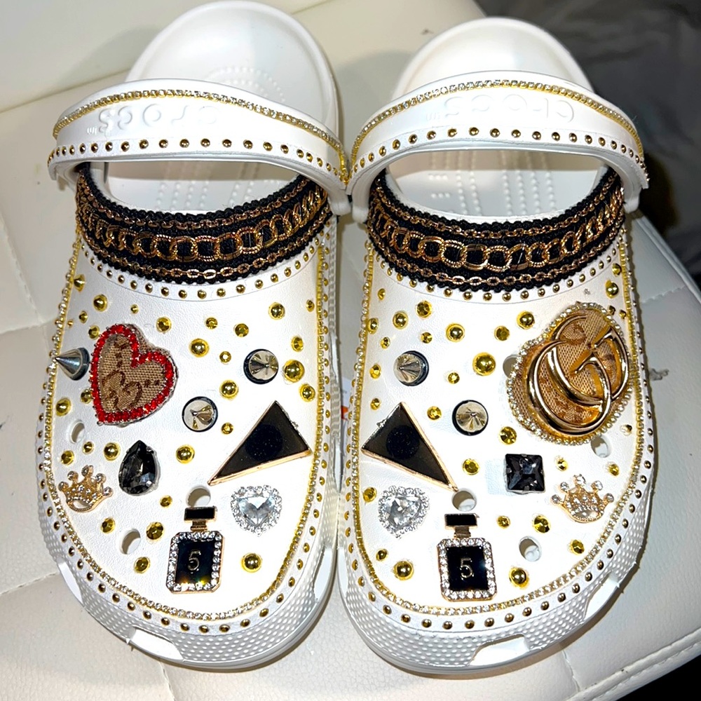 White Crocs black silver and gold decorative jibbits
